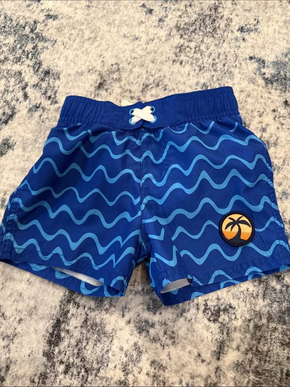 Cat & Jack Blue Wave Swim Trunks with Palm Patch